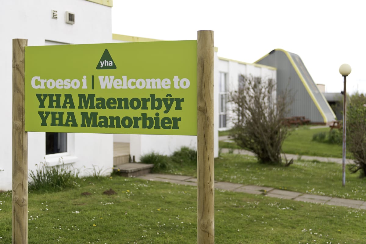 YHA Manorbier Welcome Sign