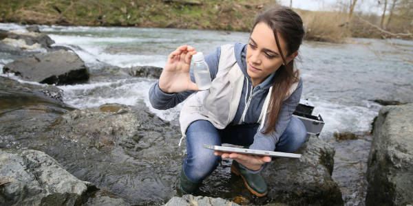 Female student conducting geography field studies