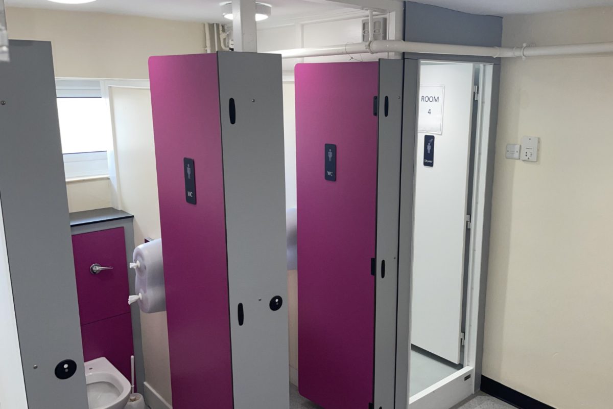Toilets and shower cubicles in shared bathroom